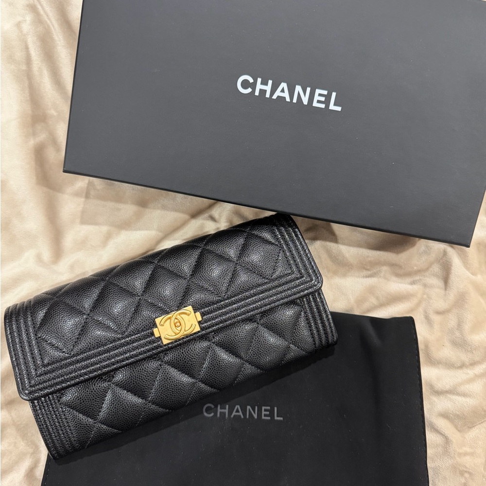 CHANEL Black Quilted Wallet with Gold Accent
